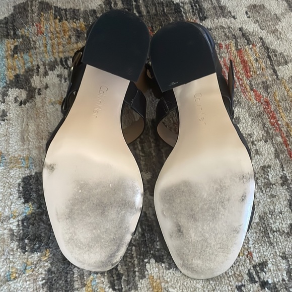 Calvin Klein- Black high heel. Heel is clear lined with a strip of gold. - Picture 4 of 7